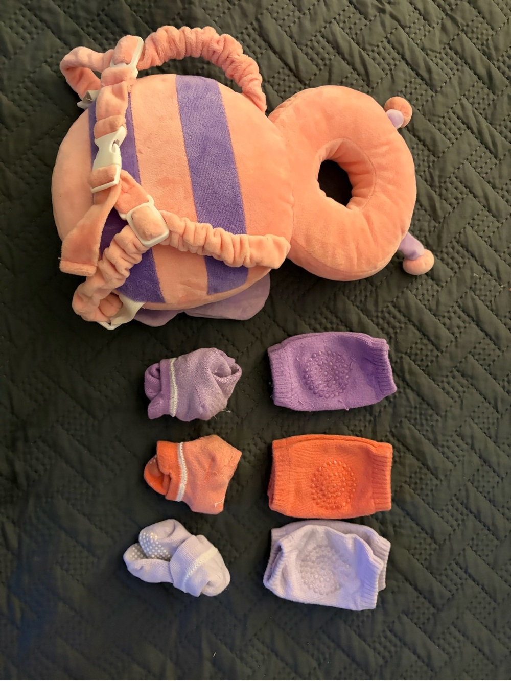 Infant head protection backpack with matching socks and knee protectors